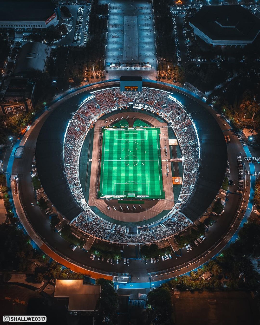 Стадионы китая. Стадион Тяньхэ. Стадион Тяньхэ Гуанчжоу. Стадион Китай 2023. Футбольные стадионы Китая.